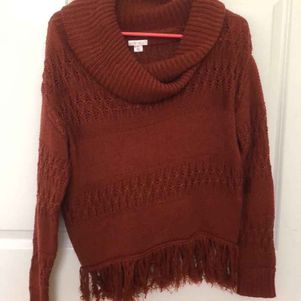 Fringe knit sweater.